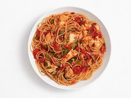 Photo of spaghetti with tilapia in spicy tomato sauce