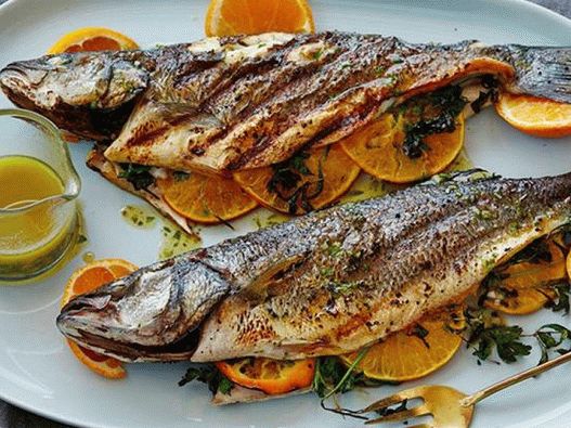 Photo of a whole grilled Mediterranean fish with sherry vinaigrette dressing with tarragon
