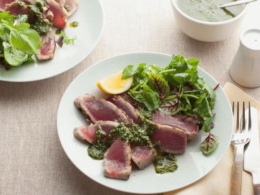 Photo of grilled tuna steak with pesto
