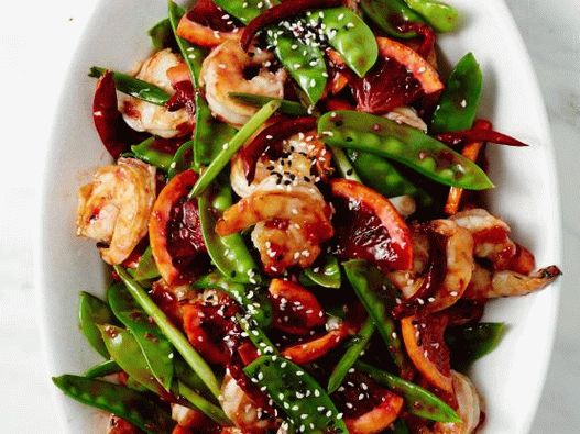 Photo of steer-fry with shrimp and red oranges