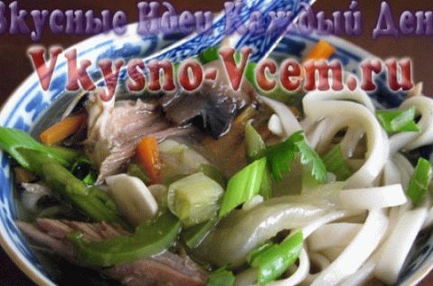 Pork soup with brussels sprouts and noodles