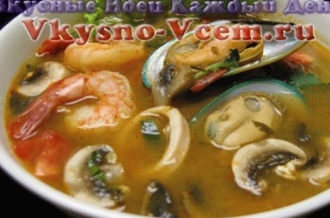Soup with coconut milk, mushrooms and seafood