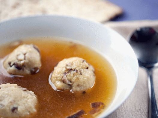 Photo Soup with truffle kneidles stuffed with shiitake mushrooms