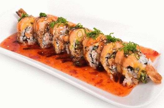 Photo Sushi rolls with shrimp in batter and ginger sauce