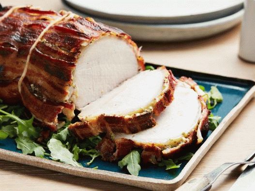 Photo of pork loin in honey mustard glaze wrapped in bacon