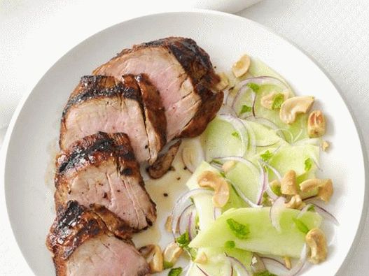 Photo grilled pork tenderloin with melon salad