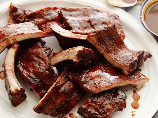 Photo of grilled pork ribs in an orange marinade