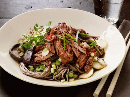 Photo Pork in a slow cooker with Asian buckwheat noodles