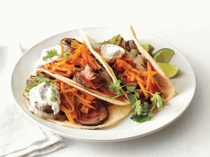 Photo of Taco carne asada with carrots and peppers
