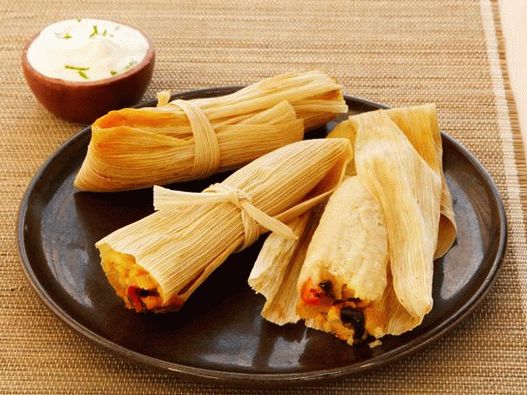 Photo of Tamale with cheese sauce stuffing