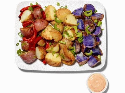 Photo Warm salad of colored potatoes, celery and sweet pepper
