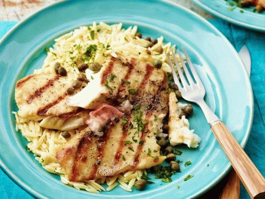 Grilled tilapia photo with lemon oil, capers and orzo paste