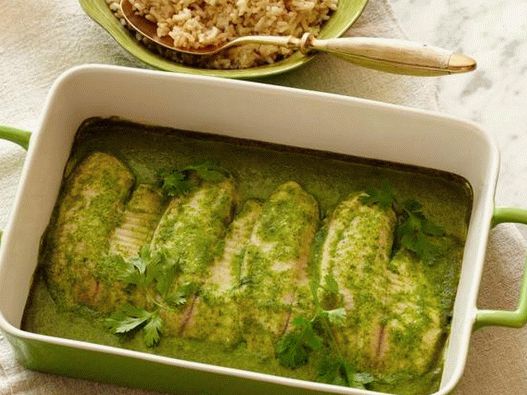 Photo Tilapia in a coconut sauce with herbs in the oven
