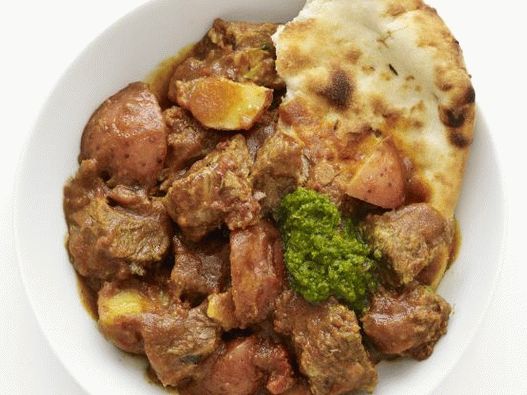 Photo of Beef Stewed in a slow cooker with curry and potatoes