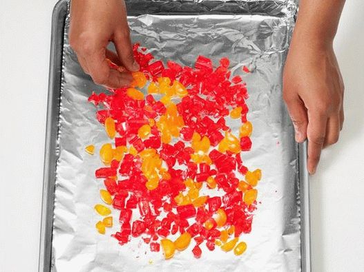 Put the candies on a baking sheet for a burning effect