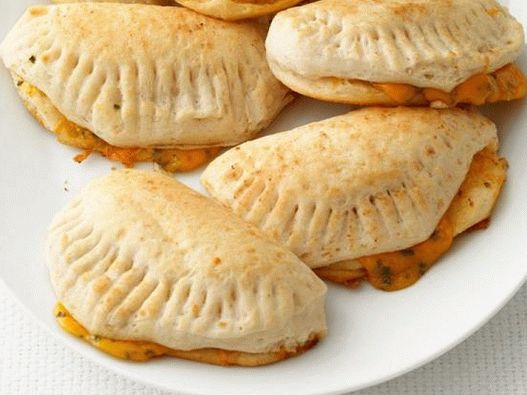 Photo Tournovers stuffed with cheddar and green onions