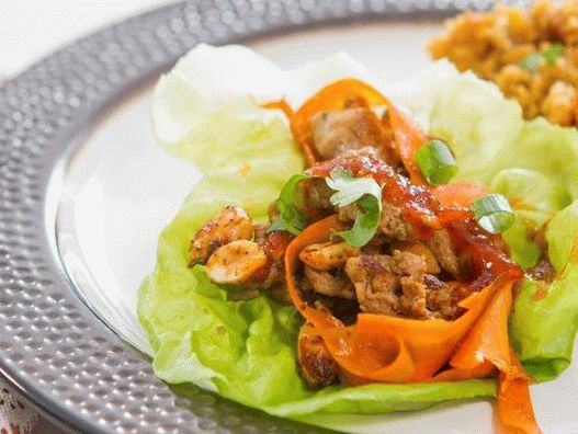 Spicy turkey appetizer on salad leaves with red pepper jam