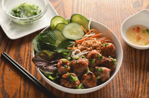 Photo of Vietnamese BBQ pork meatballs (Nem Nuong) with fish sauce