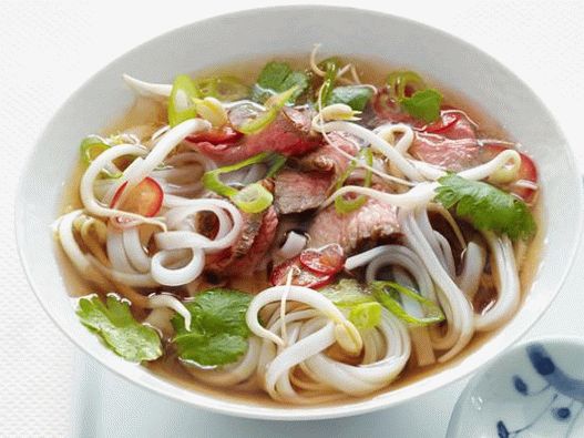 Photo of Vietnamese Pho Bo soup (noodle soup with beef)