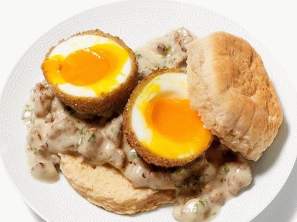 Photo Deep fried eggs in meat sauce