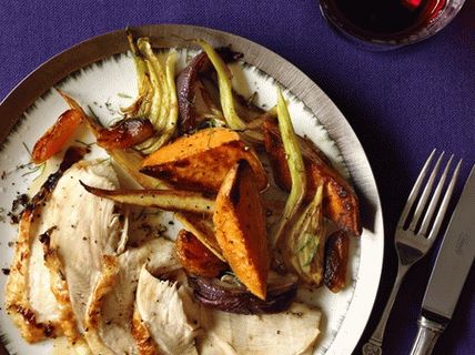 Photo Baked turkey breast with vegetables