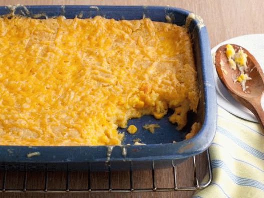 Photo Baked corn under a cheese crust