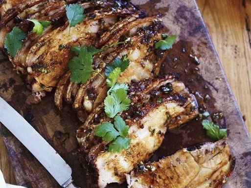 Photo Baked pork tenderloin with herbs