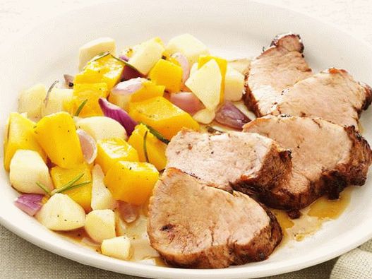 Photo Baked pork with pumpkin and apple religion