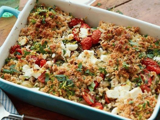 Photo Baked eggplant with tomatoes with shtrezelom