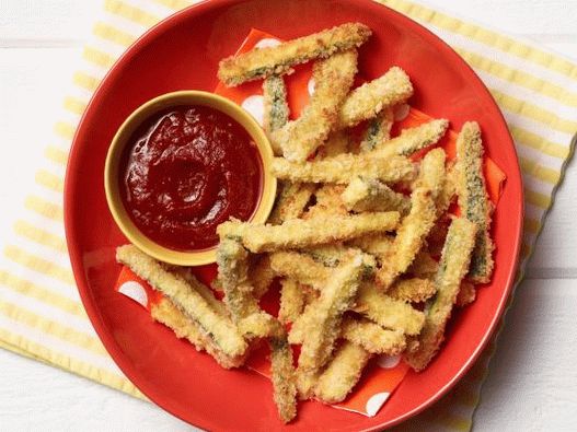Photo Baked zucchini breaded with parmesan