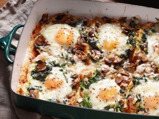 Photo of Baked eggs in the oven with mushrooms and spinach