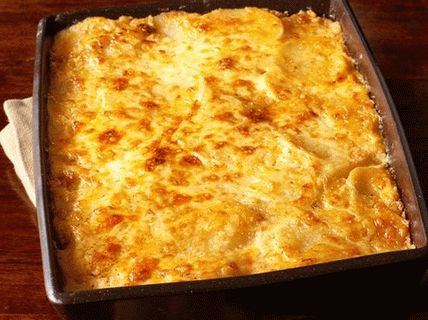 Photo Baked Potato with Cheese and Cream