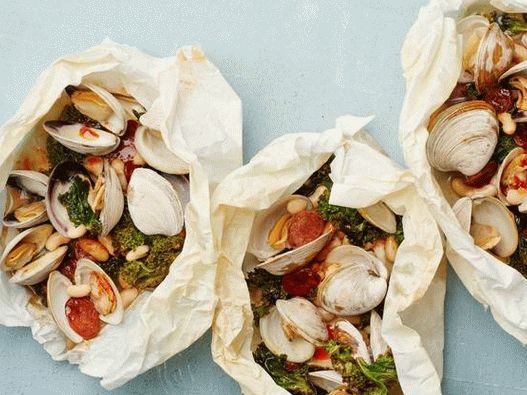 Shellfish with cabbage kale and sausage chorizo ​​in parchment