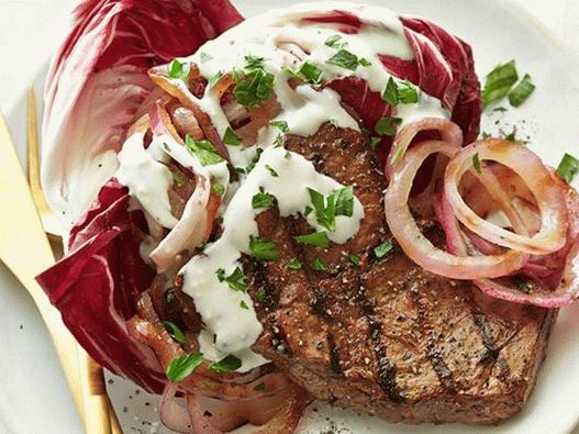 Marinated flank steak with blue cheese sauce