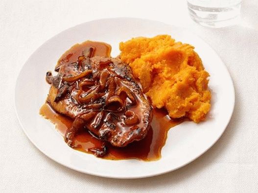 Turkey steak with mashed potatoes and orange sauce