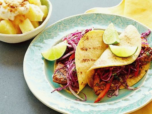 Tacos with fried pork, cabbage and pineapple