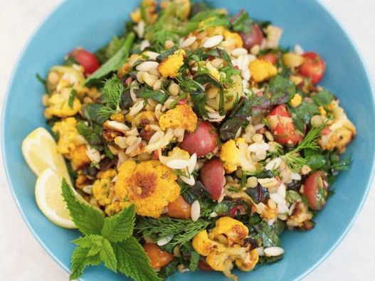 Lentil and orzo pasta salad with baked cauliflower, chard and herbs
