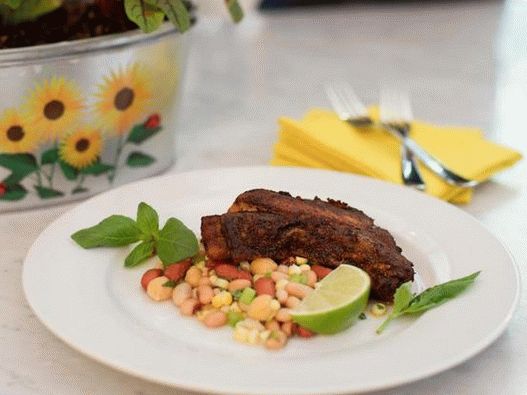 Fried hake in spices with chilled bean salad