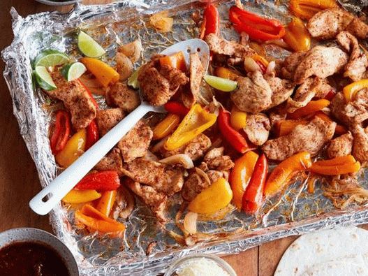 Fajitas with chicken on a baking sheet