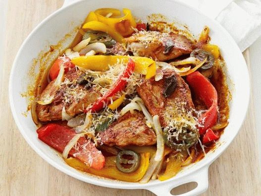 Pork with bell pepper in a pan