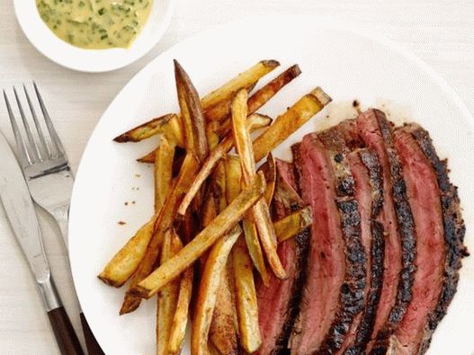 Beef steak with mustard sauce and potatoes