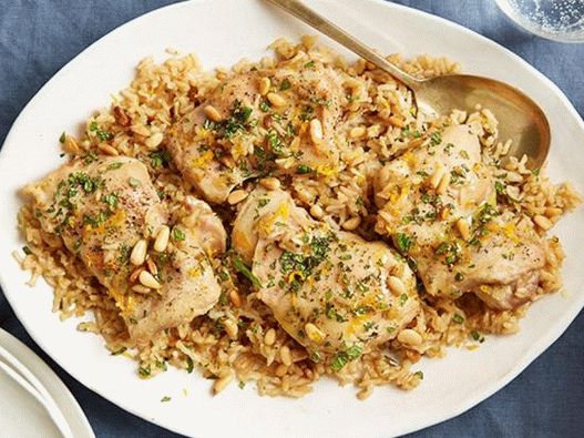 Chicken on a pillow of rice in the oven