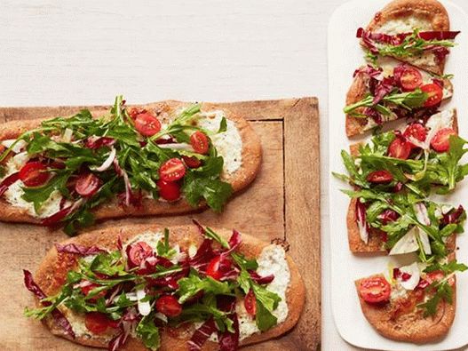 Pizza with tricolor salad