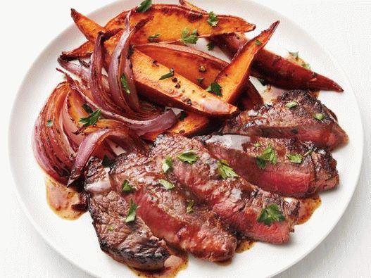 Photo Roasted Beef Steak with Beer Sauce and Baked Sweet Potato