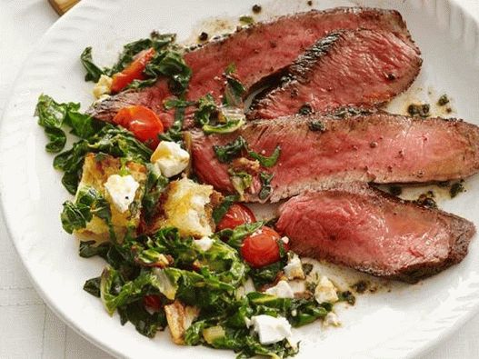 Photo Pan-fried steak with chard salad