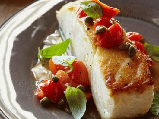 Photo of Fried halibut with pumpkin seeds, capers, cherry tomatoes and basil