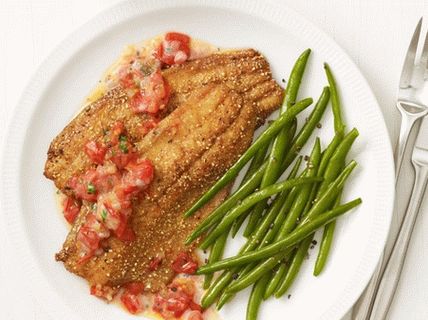 Photo Fried trout fillet breaded with cornmeal