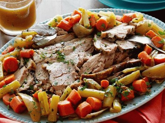 Photo Roast pork in a slow cooker